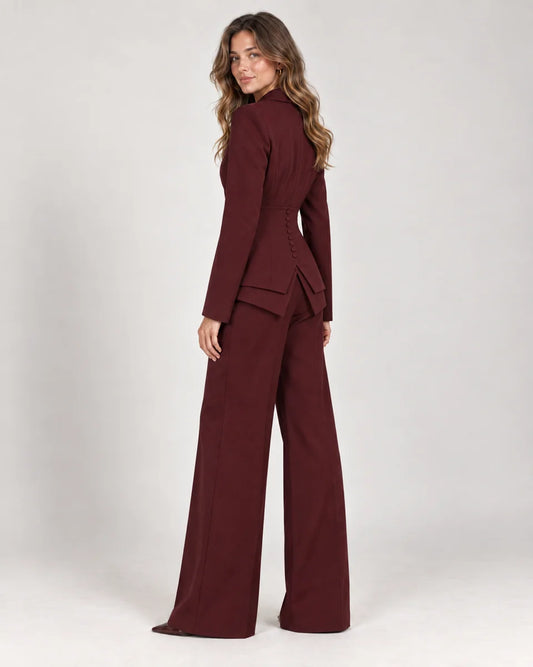 Fenna women's tailored three-piece suit with wide-leg trousers in Burgundy, side view on a model