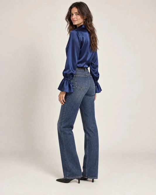 Scarlett women's silk blouse with button-down and puff sleeves in Navy, side view on a model