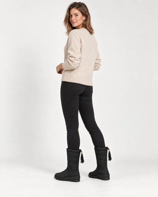 Sigrid women's quilted mid-calf winter boots in Black, back view showing the drawstring tassel tie