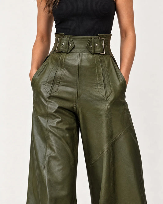 Amalie wide-leg pants in dark green, close-up of the wide waistband with a two-buckle belt