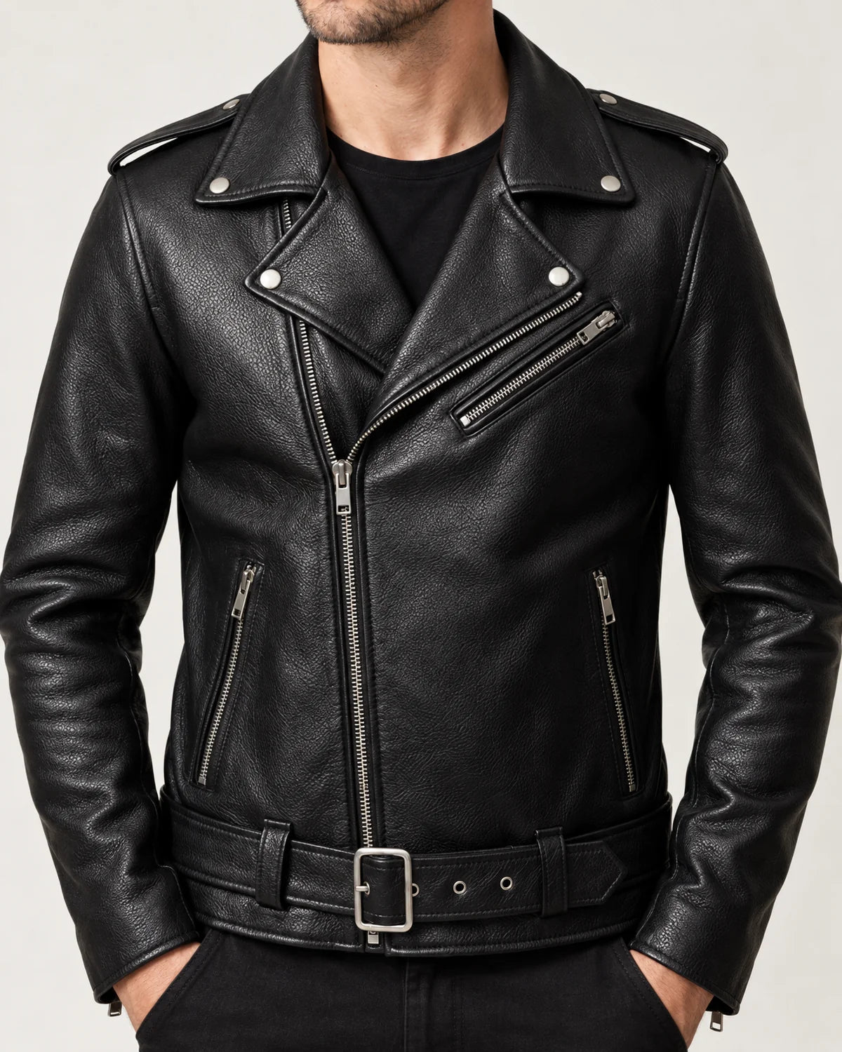 Alaric men's belted biker jacket in black, close-up detail of the asymmetric zip and belt buckle