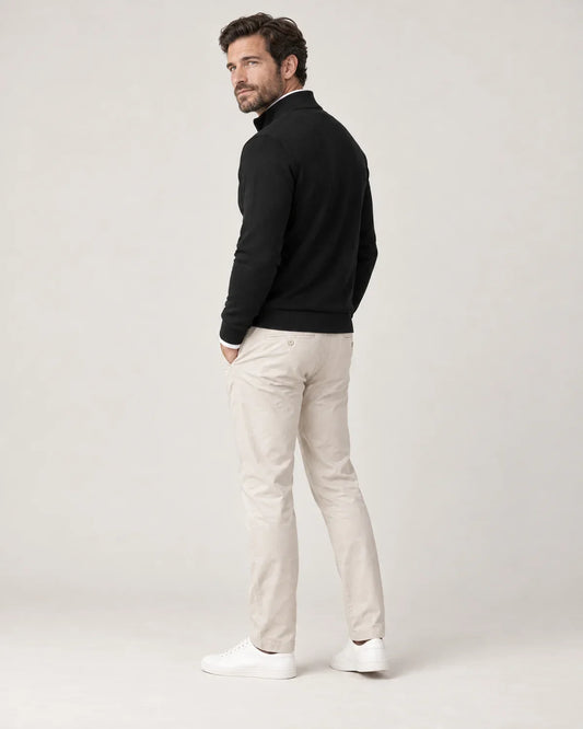 Ansel men's half-zip sweater with stand collar in Black, side view on a model