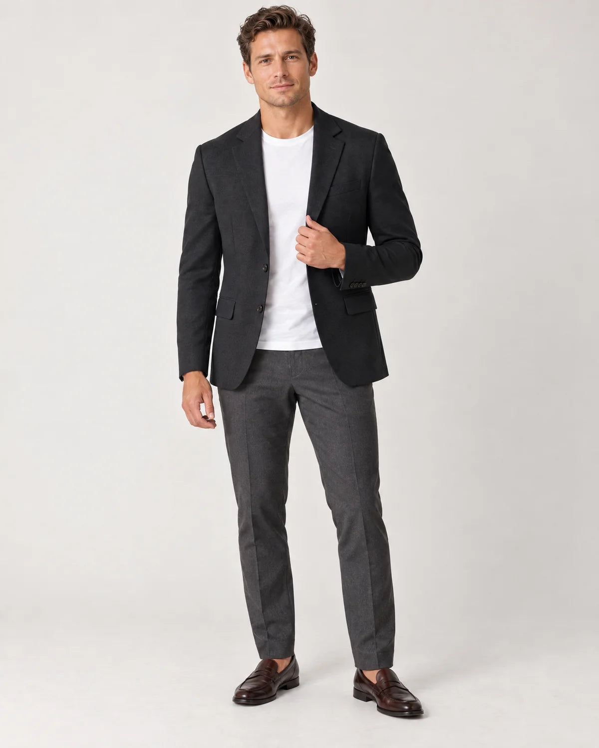 Ellery men's tailored knit blazer in Black, front view worn open over a white t-shirt