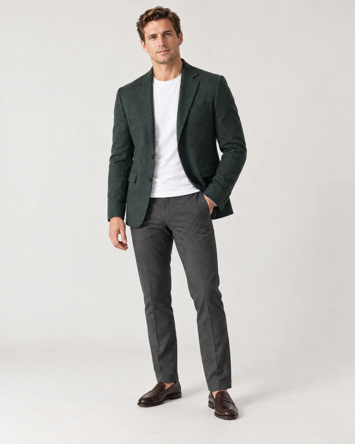 Ellery men's tailored knit blazer in Dark Green, front view on a model