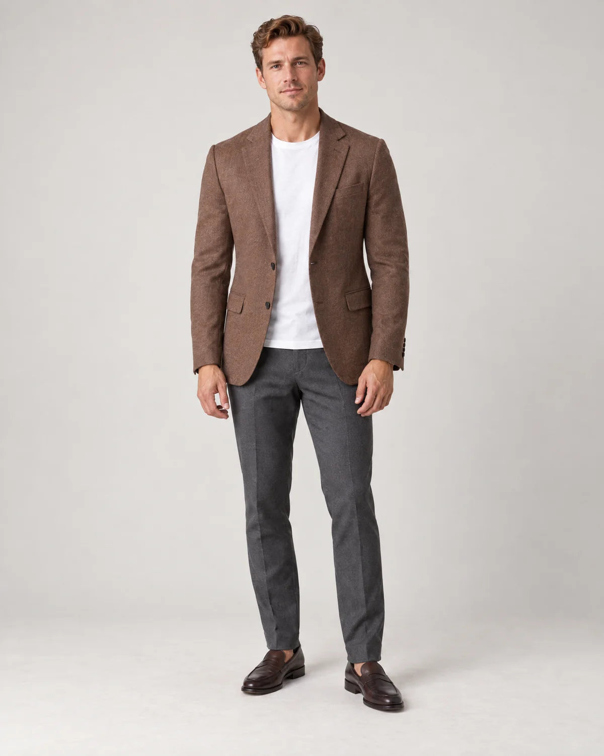 Ellery men's tailored knit blazer in Brown, front view on a model