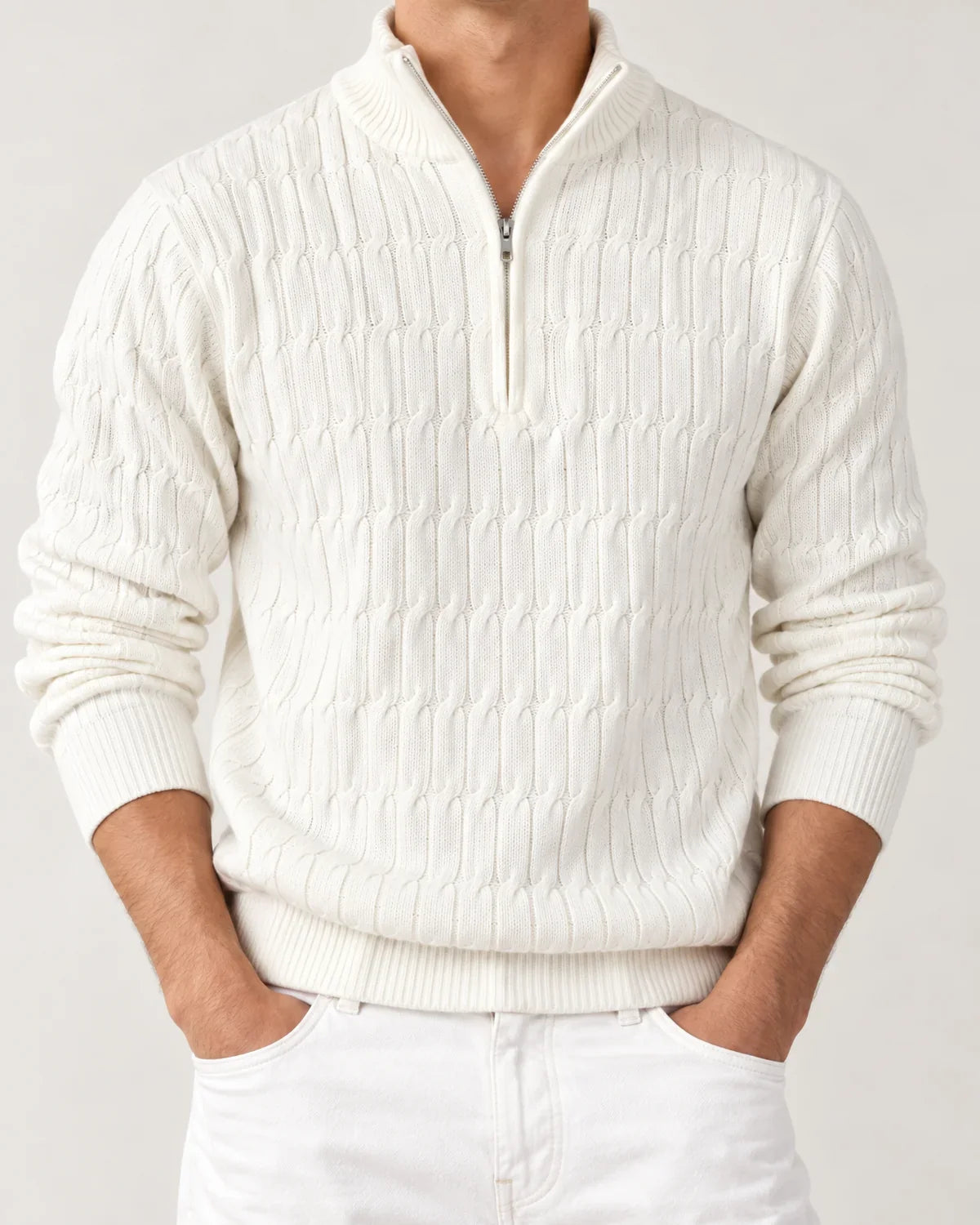 Emory men's cable knit quarter-zip sweater with funnel neck in White, close-up detail of the fabric and closure