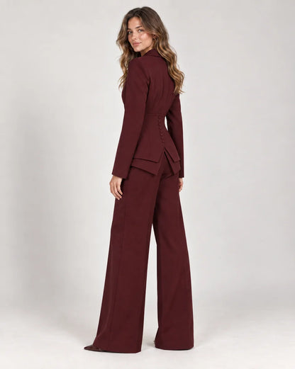 Fenna women's tailored three-piece suit with wide-leg trousers in Burgundy, side view on a model