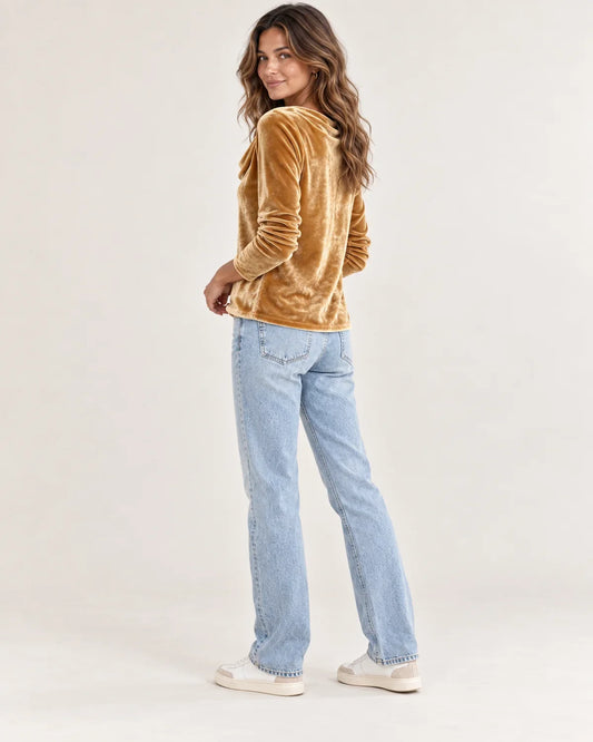 Iliana women's velvet top with cowl neck in Green, side view on a model