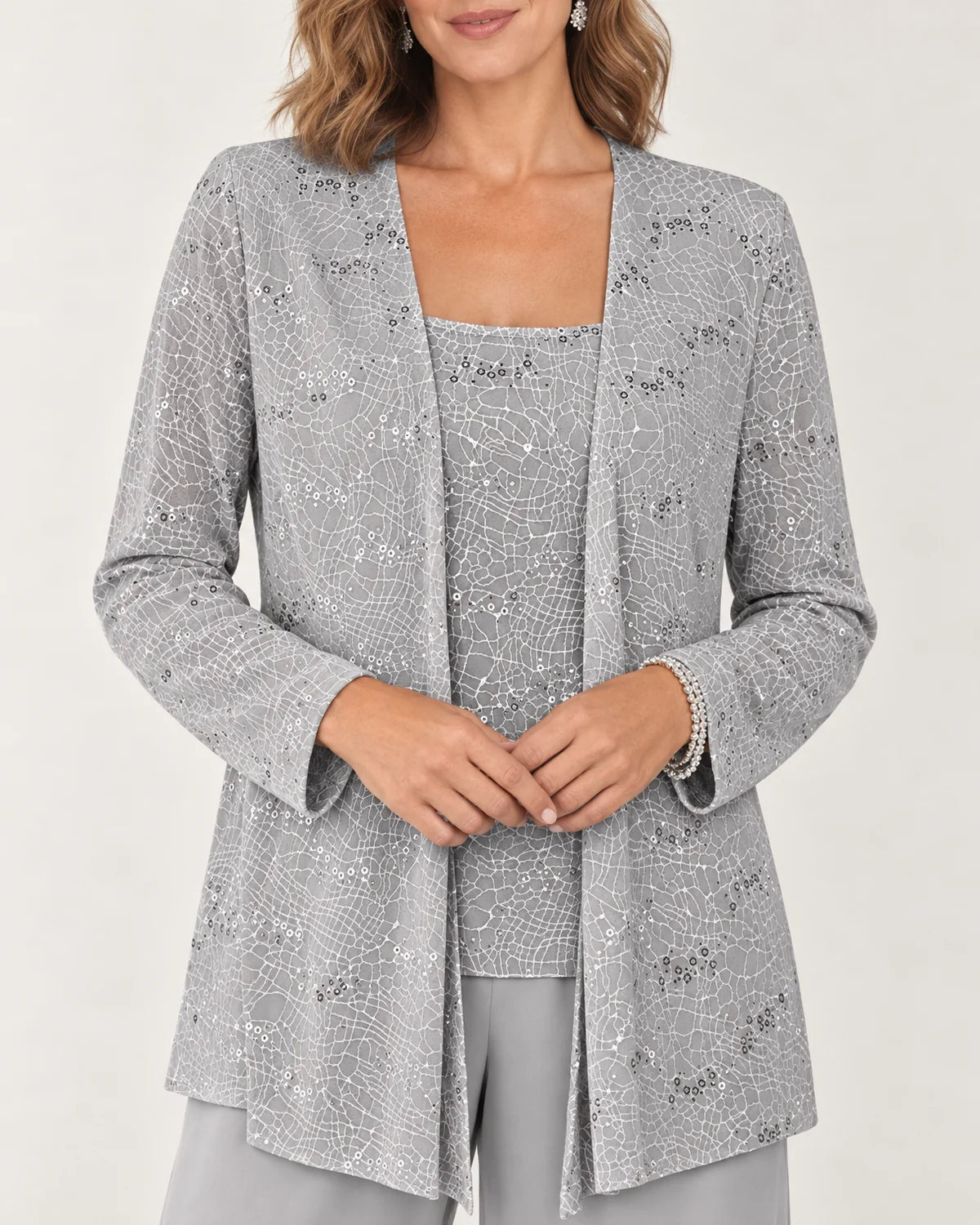 Aurelie three-piece pant set, close-up of the silver lace with small sequins and the square neckline