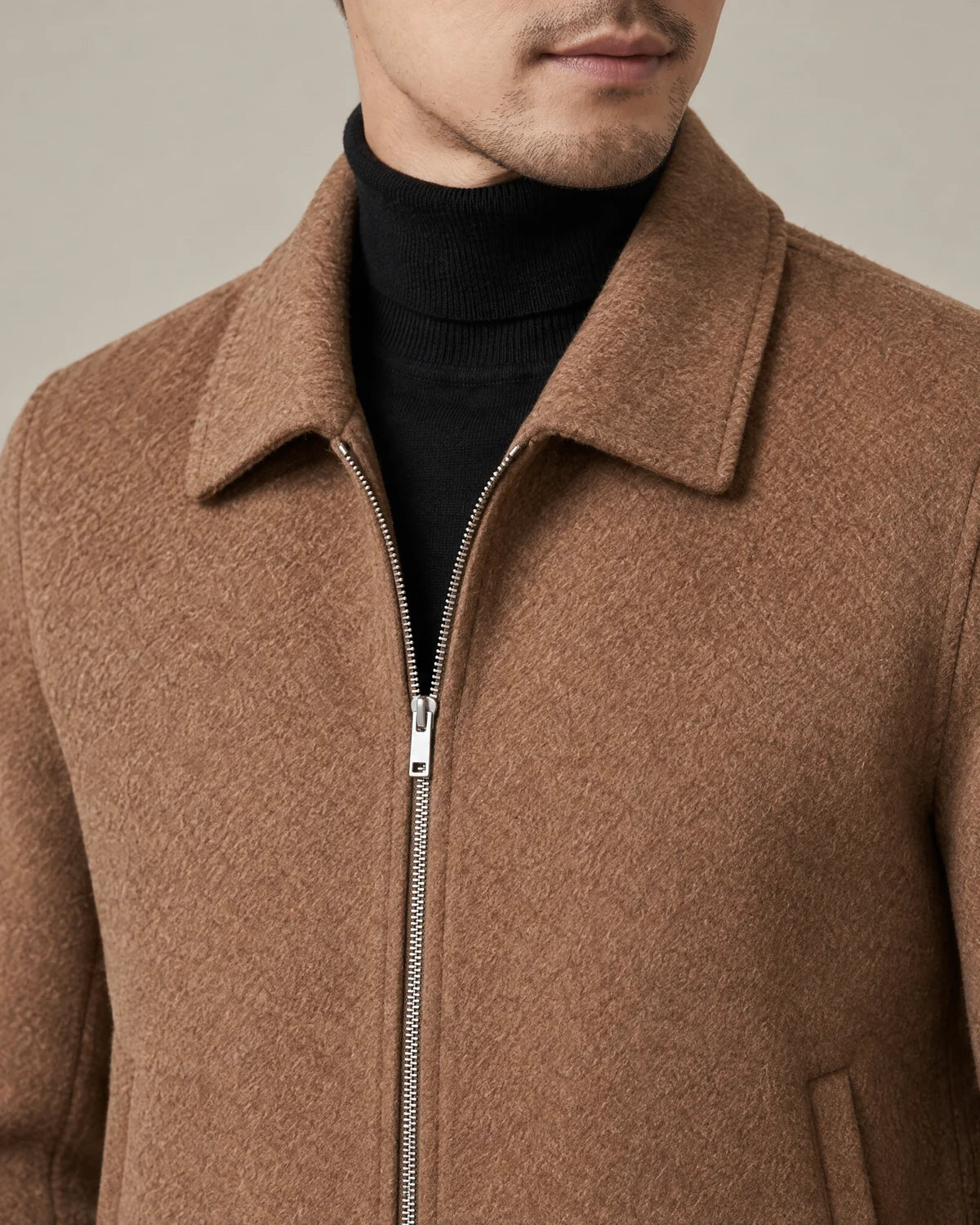 Lennox men's collared zip-up jacket in Brown, close-up detail of the spread collar, metal zip and brushed fabric