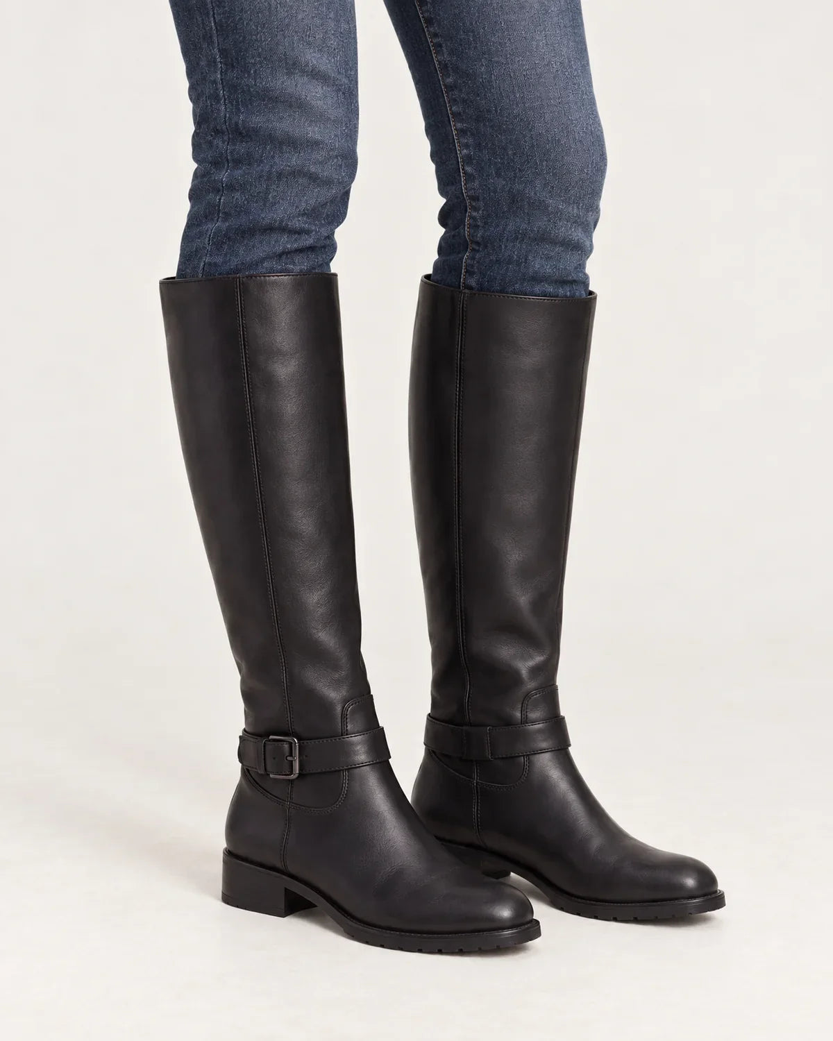 Linnea women's knee-high riding boots in Black, close-up detail of the fabric and closure