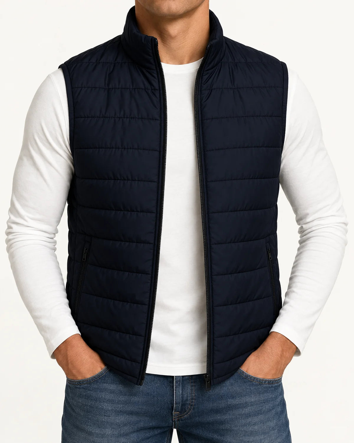 Rowan men's quilted puffer vest in navy, close-up of the stand collar, front zip and zip hand pockets