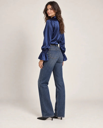 Scarlett women's silk blouse with button-down and puff sleeves in Navy, side view on a model