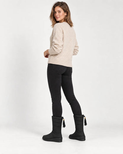 Sigrid women's quilted mid-calf winter boots in Black, back view showing the drawstring tassel tie
