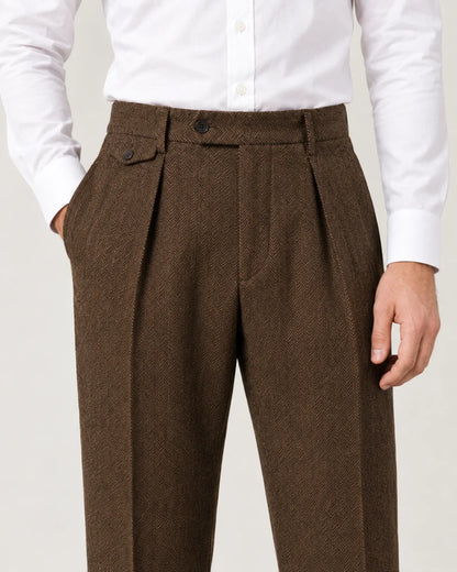 Sinclair men's herringbone pleated straight-leg trousers in Brown, close-up detail of the fabric and closure