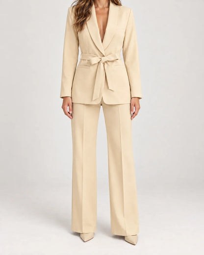 Solene women's belted blazer and wide-leg trouser suit set in Beige, close-up detail of the fabric and closure