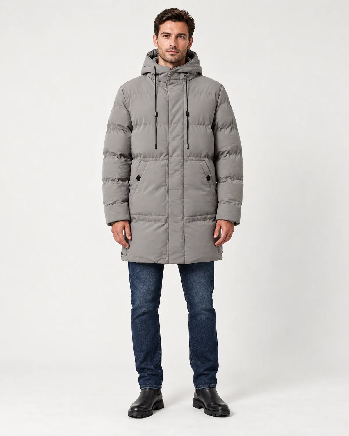 Thorne men's hooded longline padded parka in grey, front view with the hood down