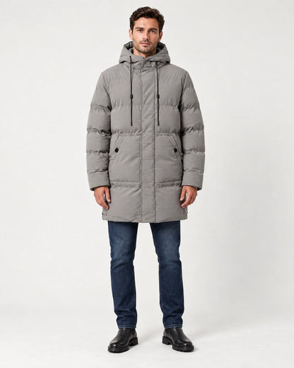 Thorne men's hooded longline padded parka in grey, front view with the hood down