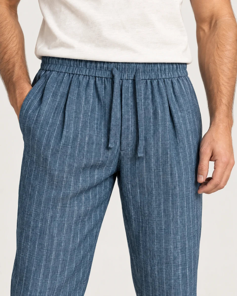 Whitfield men's pinstripe tapered trousers in Blue, close-up detail of the fabric and closure
