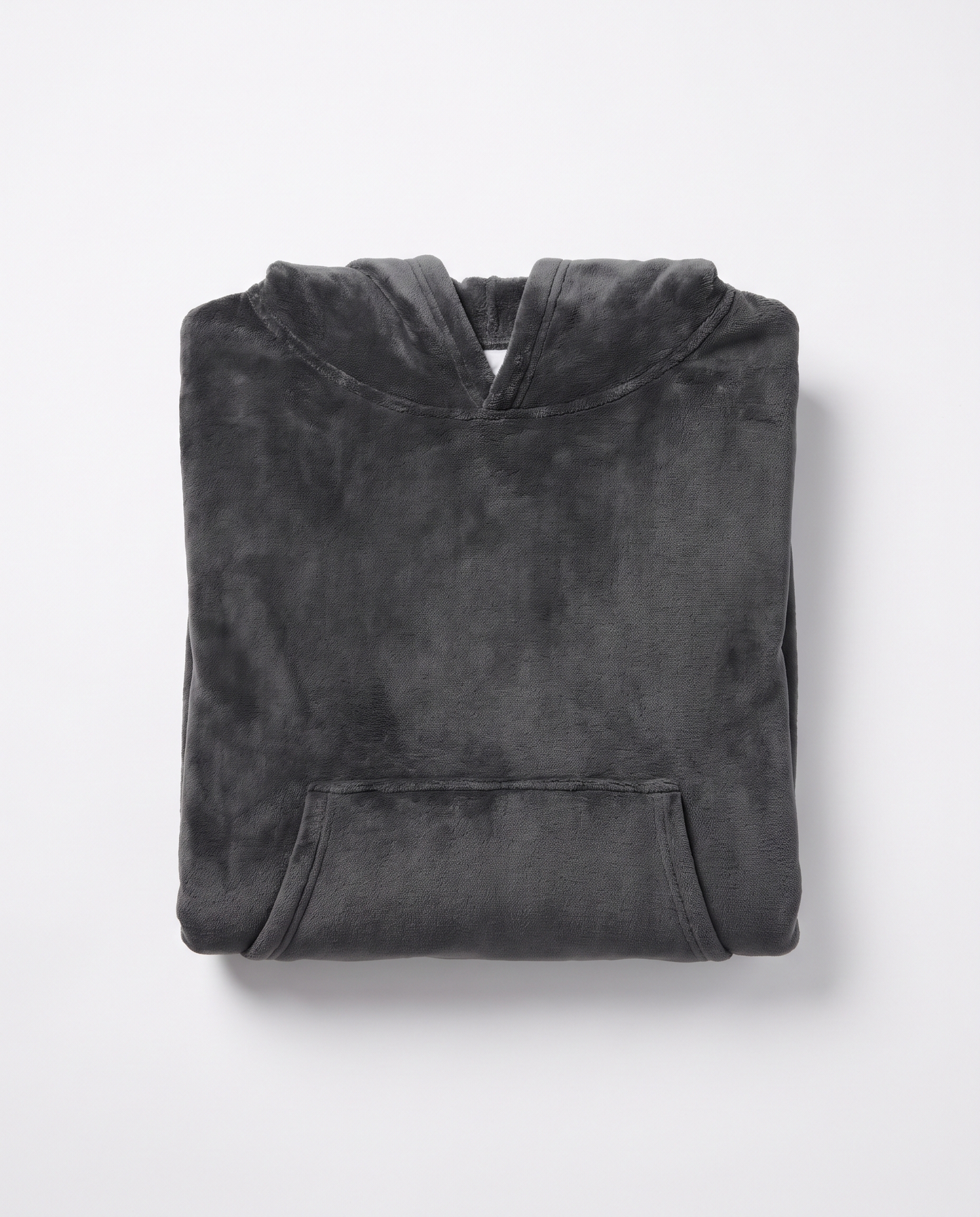 Juna oversized hooded blanket in charcoal, folded flat on white with the hood and front pocket visible
