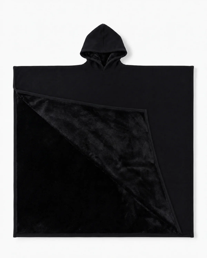 Juna oversized hooded blanket in black, laid flat on white with the hood visible