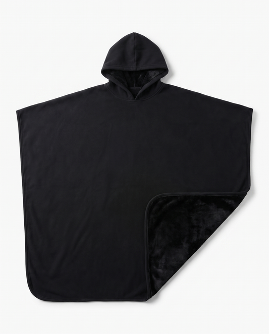 Juna oversized hooded blanket in black, laid flat on white with the hood visible